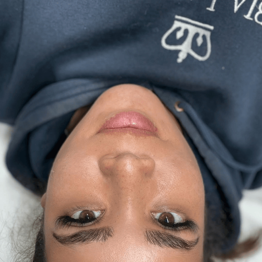 Professional eyebrow treatment showcasing brow lamination and tinting results
